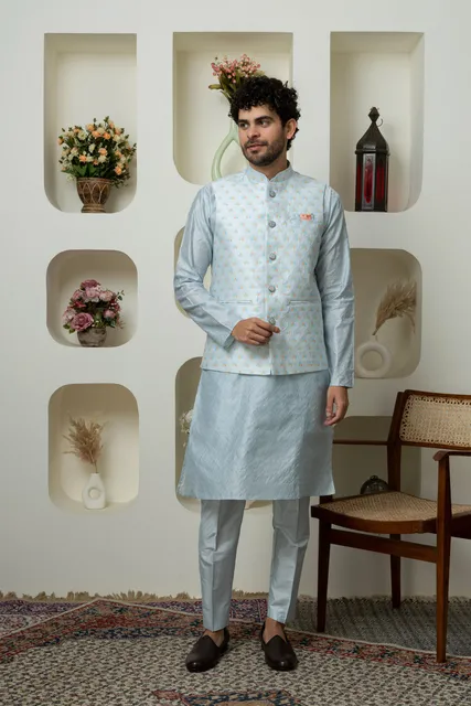A man in an ash-grey cotton-silk kurta with a matching nehru jacket